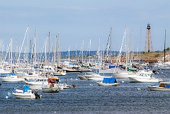 Marblehead Light Overlooking Moored Boats in Harbor